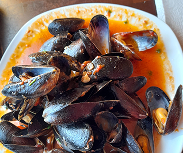 Muscheln in Tomatensoße